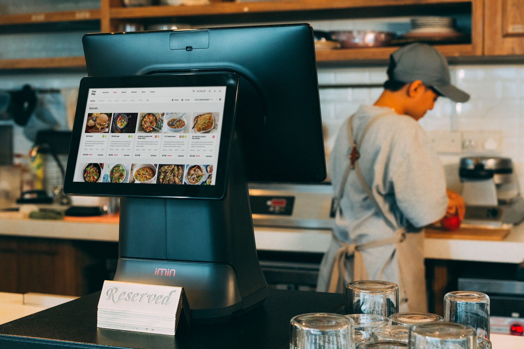 Digital ordering display operating in a restaurant kitchen